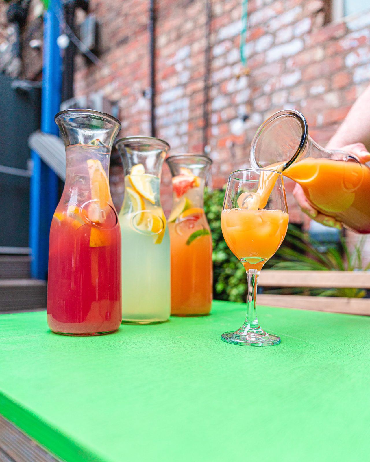 Pitchers of colourful cocktails on the terrace